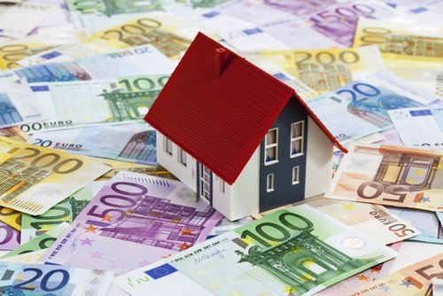 haus mit euroschein